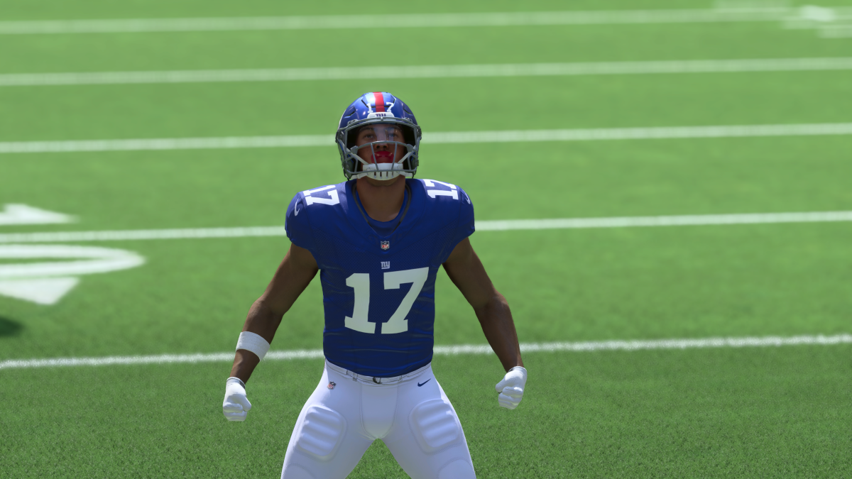 A player in Madden 24 Ultimate Team celebrates on the field.