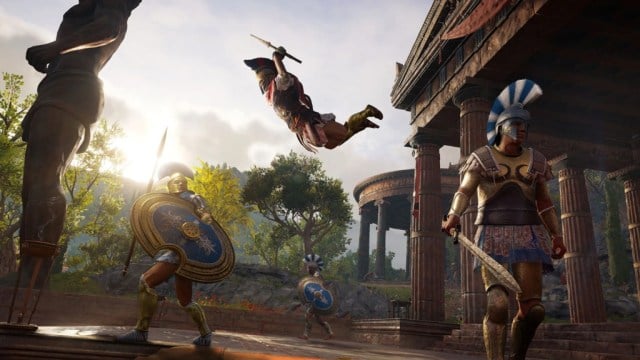 Kassandra leaps onto a guard armed with a spear in Assassin's Creed Odyssey.