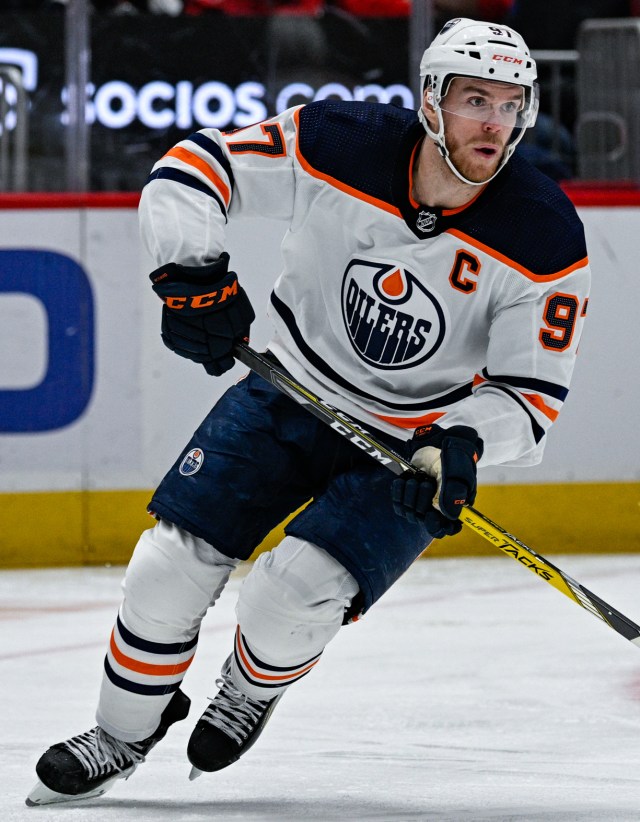 Number 97, Captain Connor McDavid with the white Edmonton Oilers jersey in February 2022. 