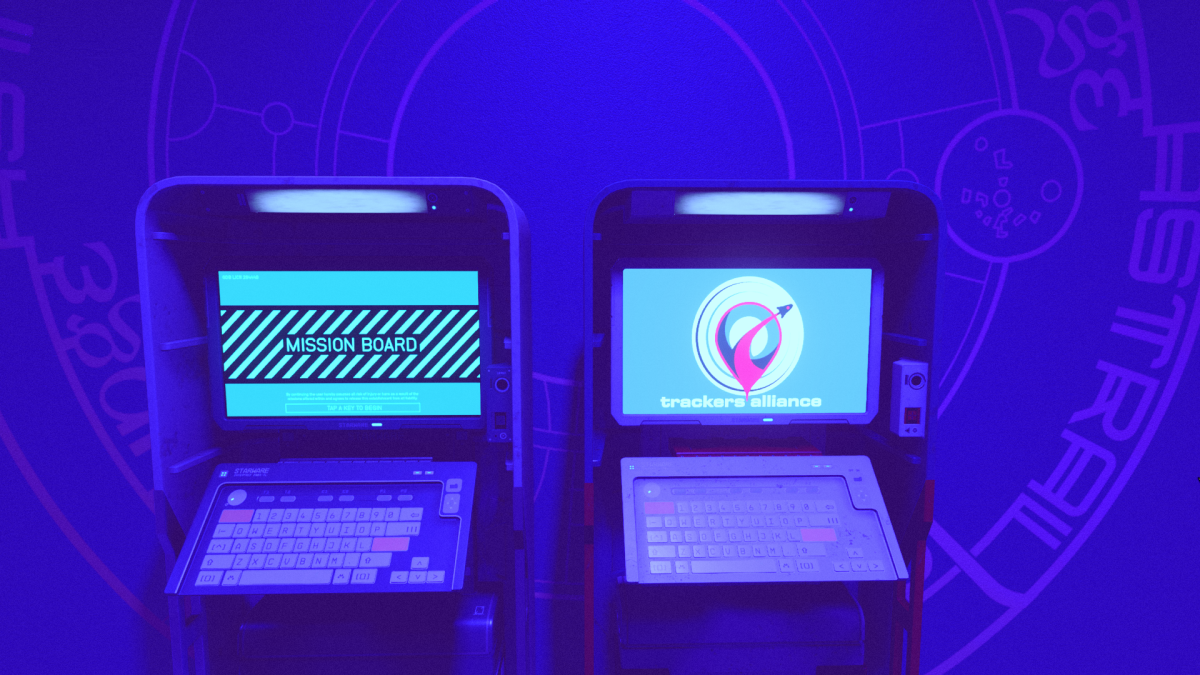 Image of two kiosks located by each other with a blue lighting atmosphere.