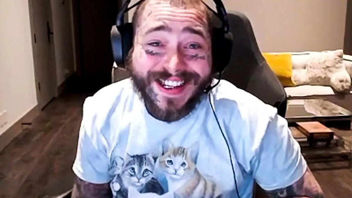 Post Malone smiling into the camera on his stream.
