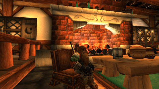 A dwarf sits in the Lakeshire Inn in WoW Classic