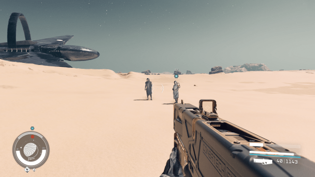 Image of two armored men standing in a desert, with a large spaceship just behind them.