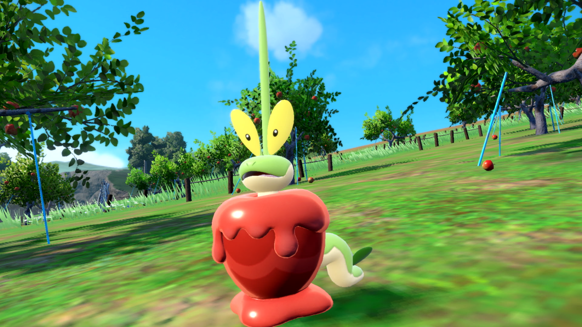 Dipplin peaking its head out of the apple in Pokémon Scarlet and Violet.