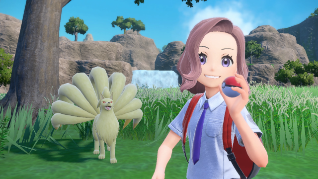A player taking a picture with a Ninetails in Pokémon Scarlet and Violet.