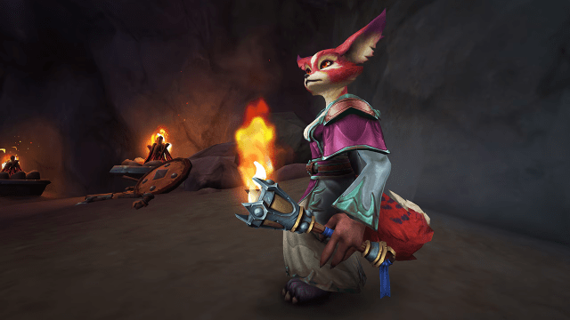 Vulpera holding the Torch of Pyrreth toy