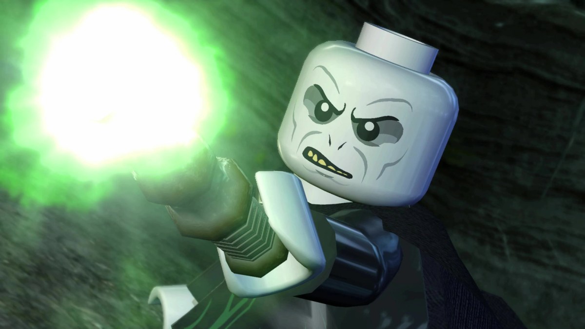 A LEGO Minifigure of Harry Potter villain Lord Voldemort is casting a spell with a green hue.