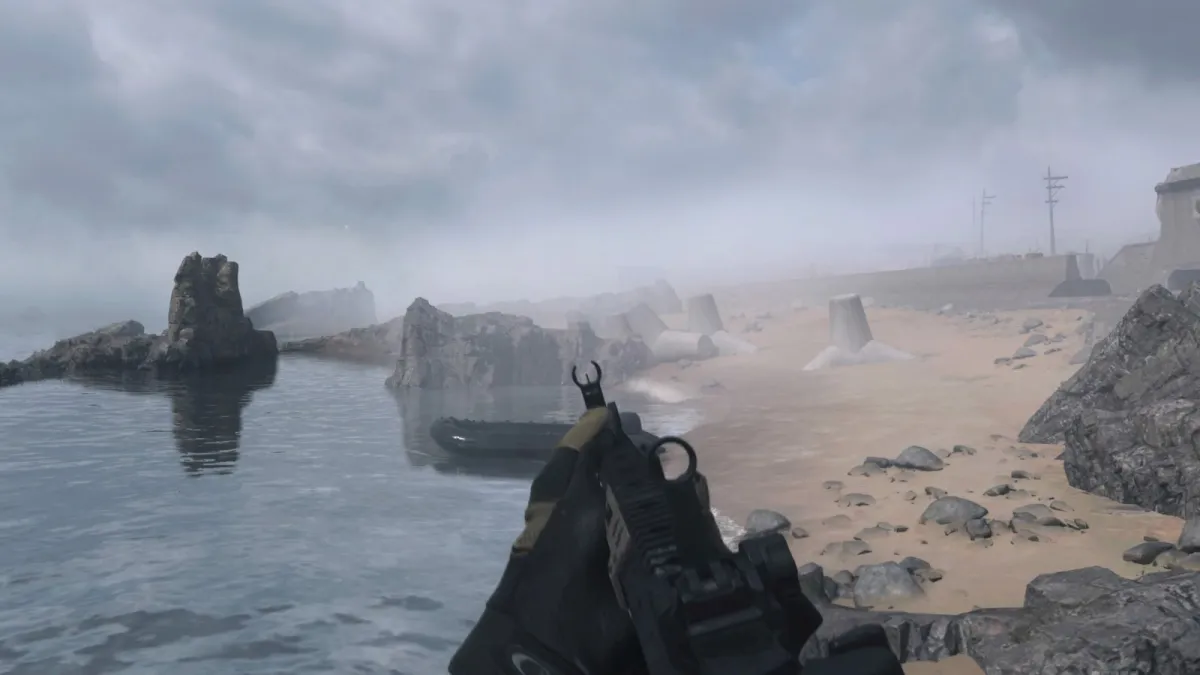 Image showcasing Ashika Island Beach with a foreboding mist circling the beaches sands. There is a visible gun on the screen painted in silver and black aiming out towards a nearby boat.