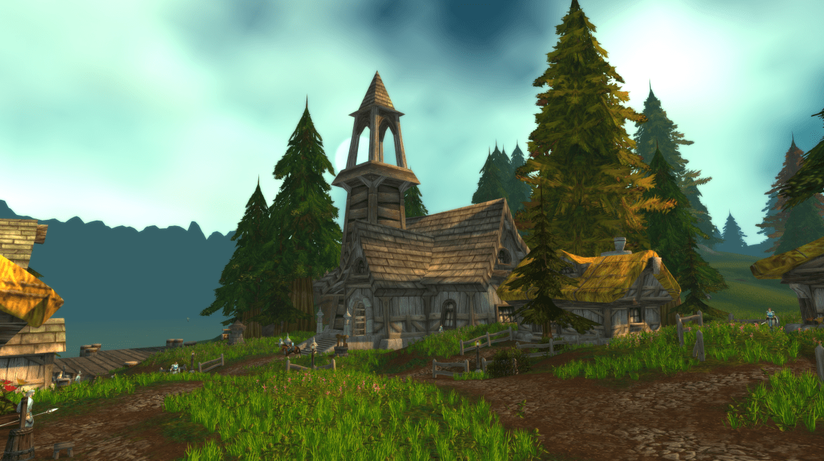 A WoW screenshot featuring the main questing buildings, town hall, and inn in Southshore, WoW Classic.