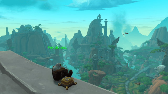 A dwarf looking over the side of a bridge in World of Warcraft. It looks like he's contemplating life.