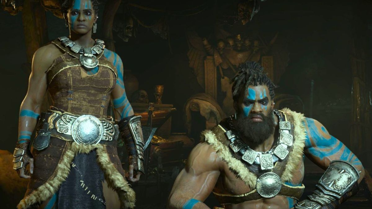 Man and woman barbarians in Diablo 4 wearing blue body paint.