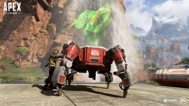 The Apex Legend Mirage respawning a fallen teammate at a Respawn Beacon in Apex Legends. 
