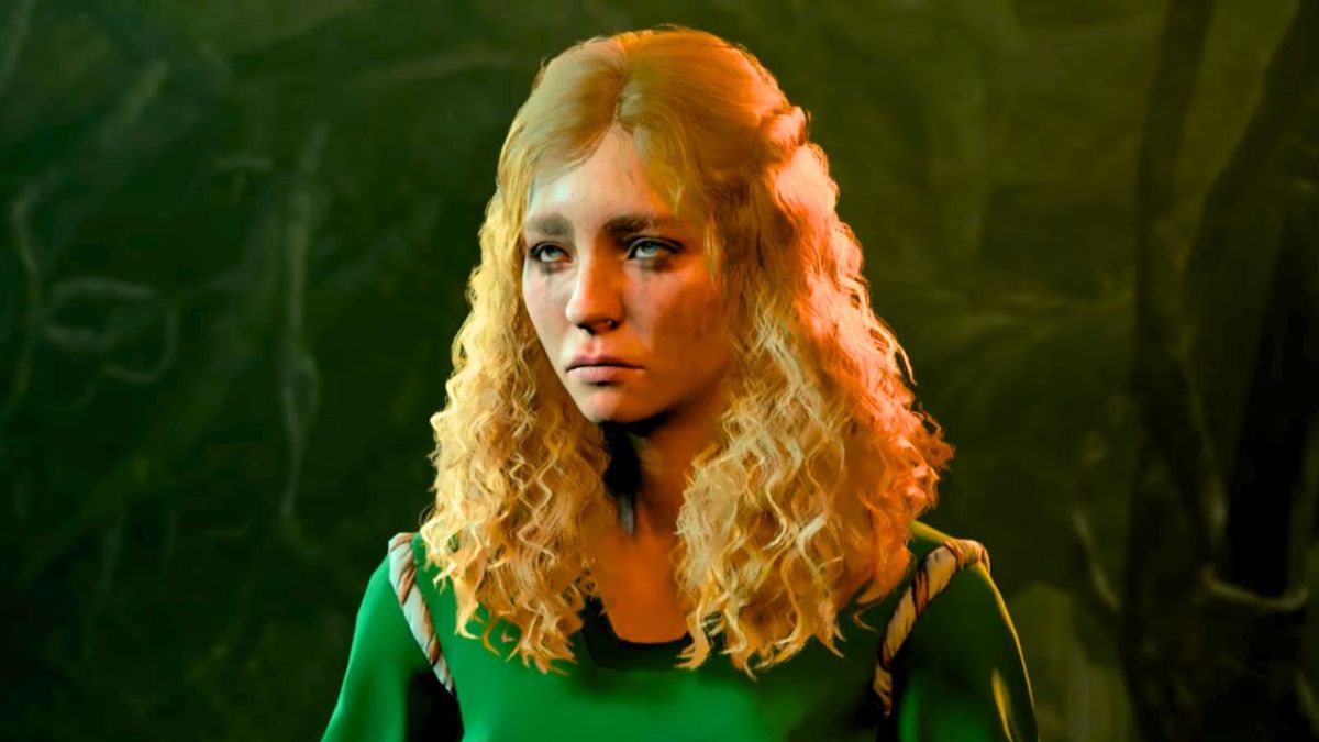 Woman with wavy hair wearing a green dress with dirt on her face in BG3.