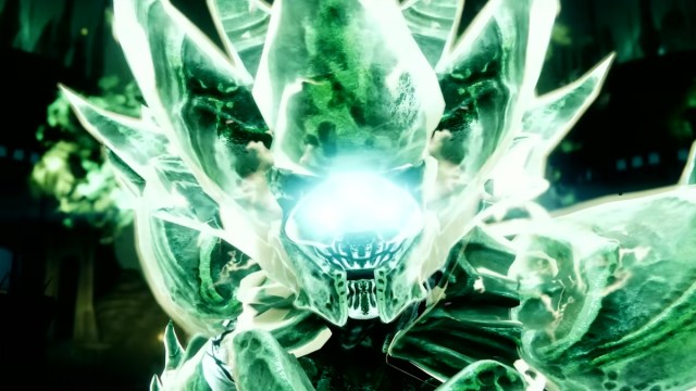 Crota, a glowing green Hive god, stares you down in Destiny 2.