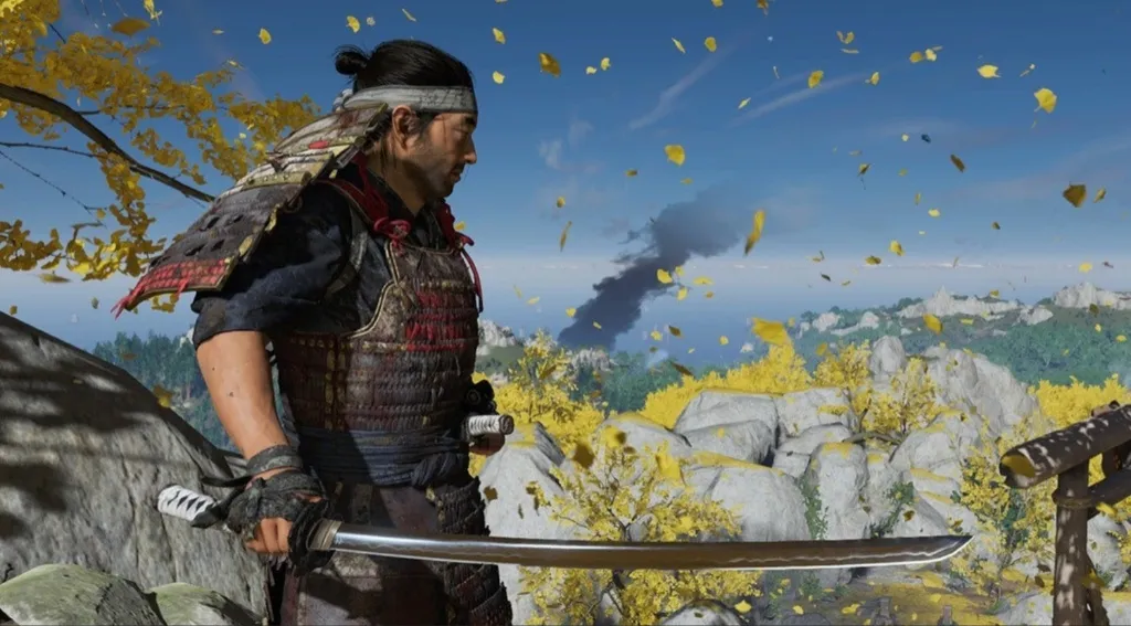 A screenshot from Ghost of Tsushima, in which the protagonist can be seen in a field holding a blade