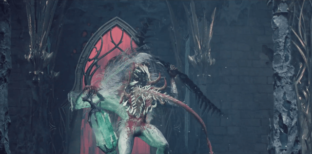 A monster opens its mouth to reveal a spiny tongue and sharp teeth in a crypt in Remnant 2.