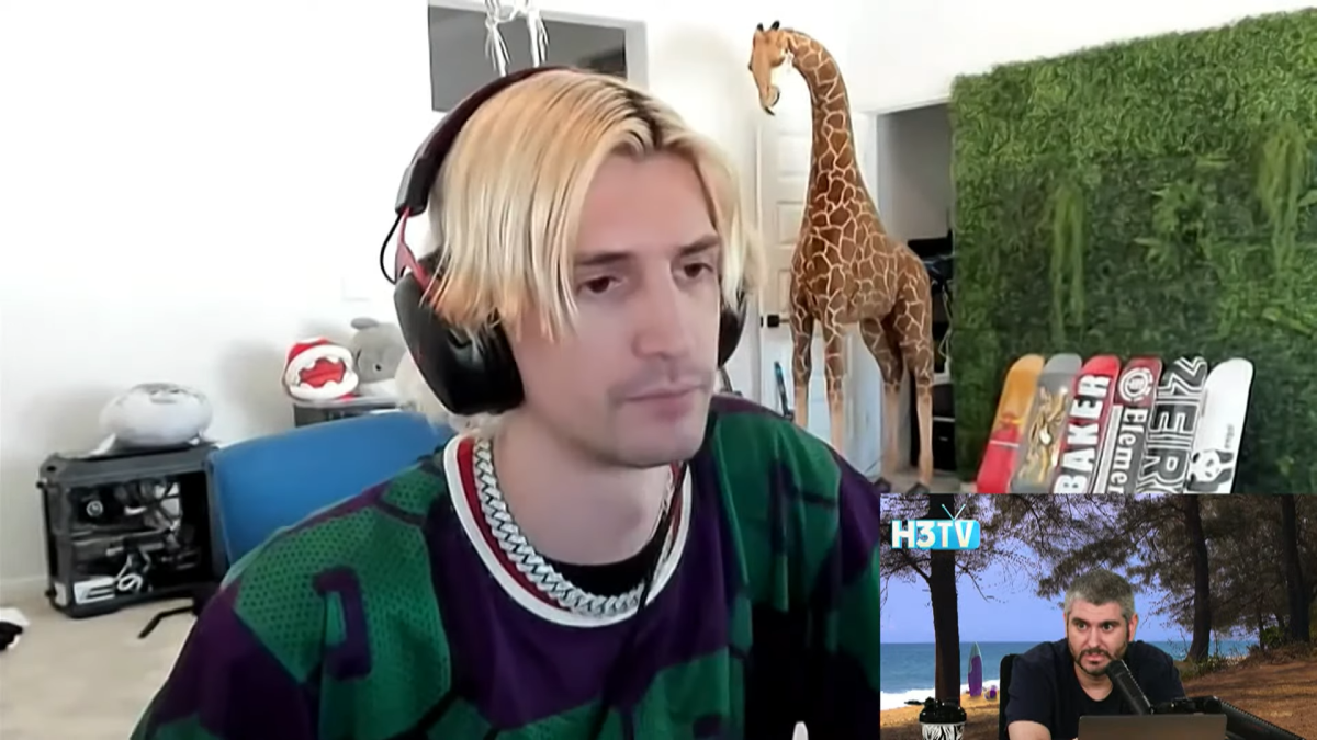 xqc sat at his desk with his blonde hair parted down the middle