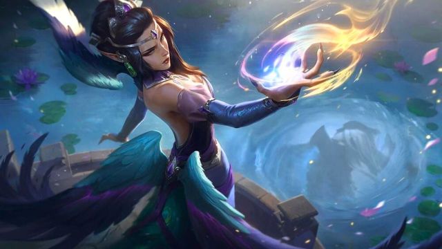 Woman with headband and flowing dress wielding a swirling ball of magic in League of Legends