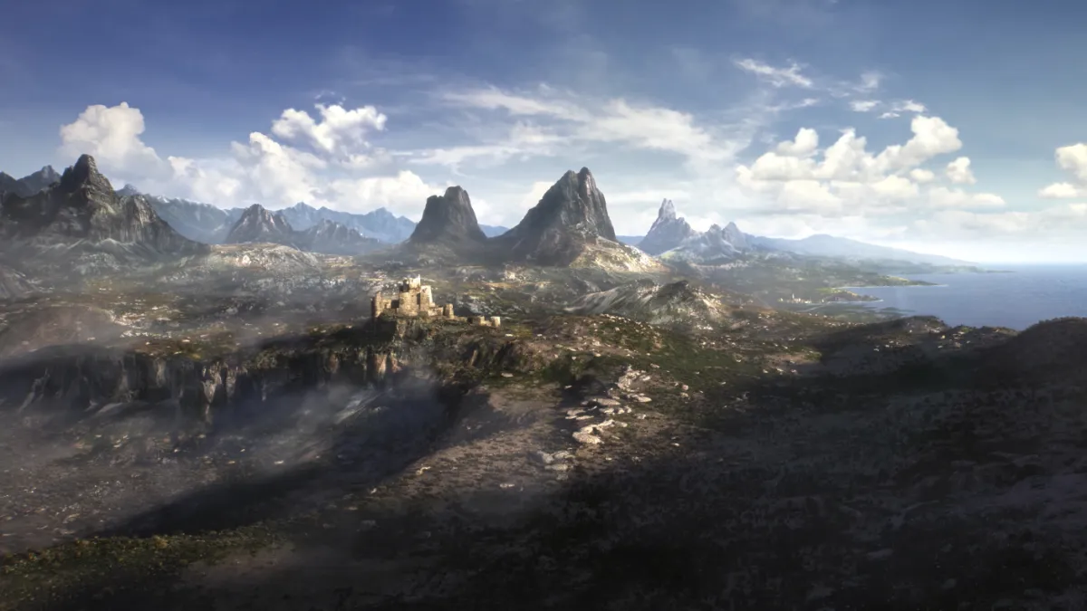 A promotional screenshot of Elder Scrolls 6 showing mountains in the distance.