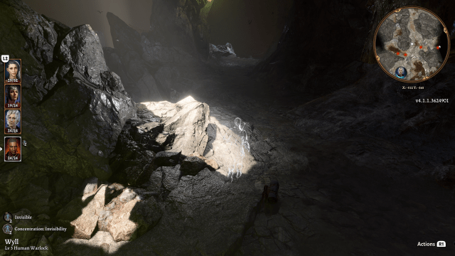 A couple shafts of light illuminate the dark cavern.