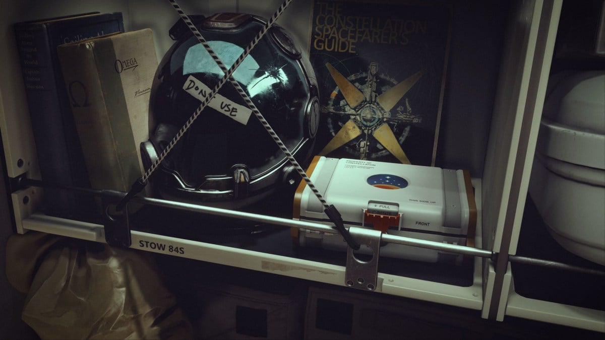 A selection of gear, including a space helmet, being sectioned off with a label stating "Don't use".