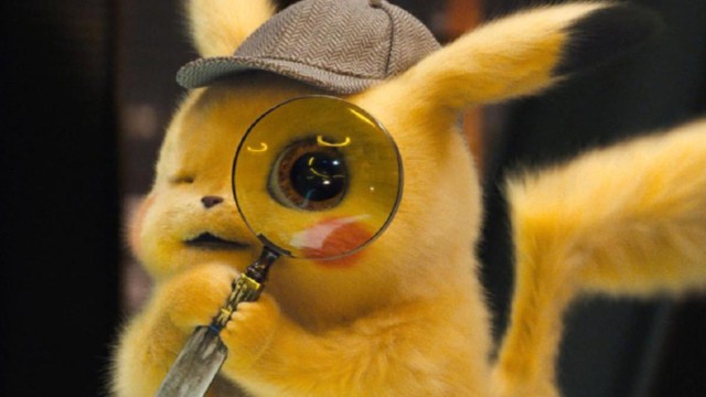 Detective Pikachu holding up a magnifying glass