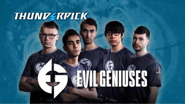 Evil Geniuses' Counter-Strike squad standing in front of a blue background, wearing their navy jerseys. 