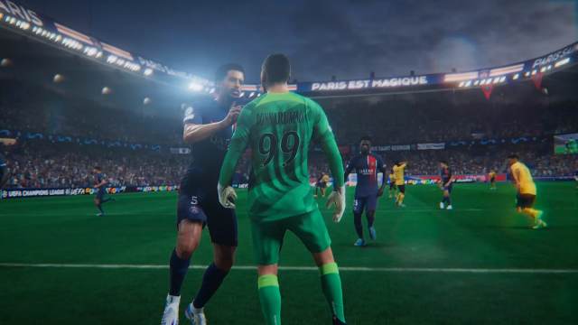 A goalkeeper in green makes a huge save, with a teammate cheering with him in EA FC 24.