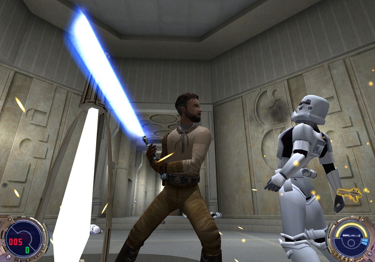 There is a Jedi slicing a stormtrooper with his lightsaber.