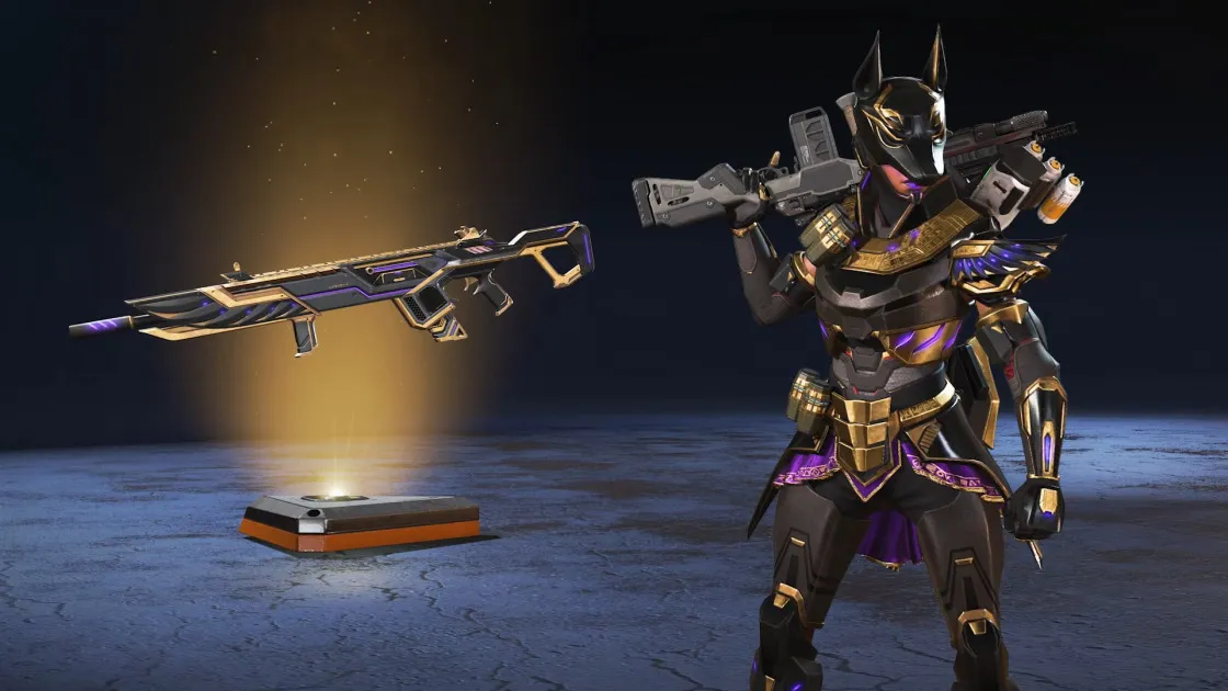 Bangalore is dressed in a black, gold, and purple skin, and wears a helmet that looks like the Egyptian god Anubis. Next to her is a matching Logbow skin.