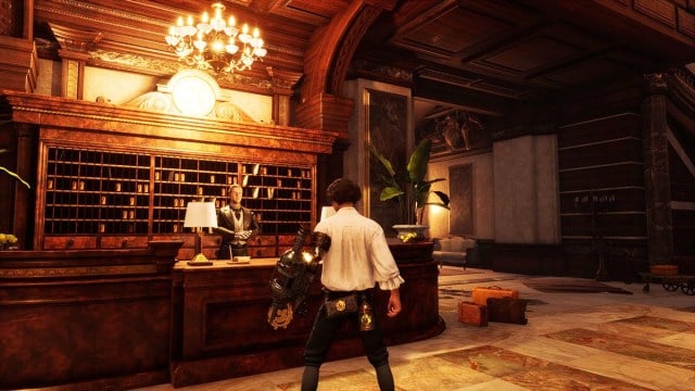 Podelina behind the counter at Hotel Krat in Lies of P