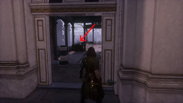 An arrow point down a ladder outside the Grand Exhibition in Lies of P