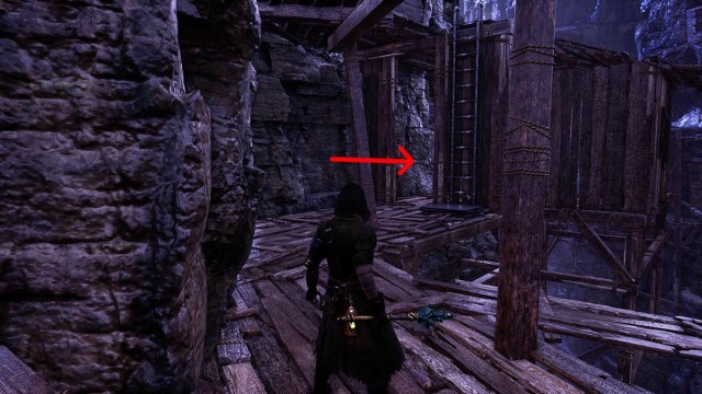 An arrow pointing to a shack next to a ladder in Lies of P
