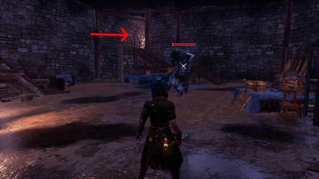 An arrow pointing to a hidden room at the back of the Hermit's Cave in Lies of P