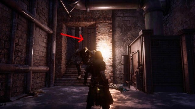 An arrow pointing up a staircase after the sewer section in Rosa Isabelle Street in Lies of P 