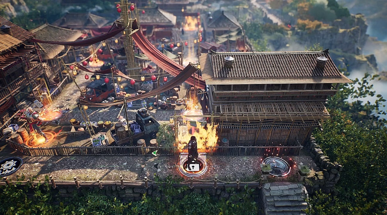 There is a view of a small town, with one path being blocked off by a fire wall. There are nodes with dragon symbols on the ground.