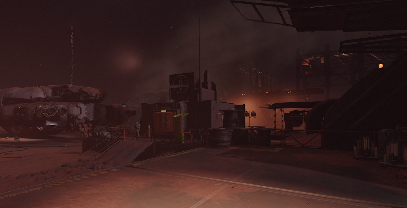 The Cydonia mining colony on Starfield. A dark and dusty area with guards standing in front of one of the gates.