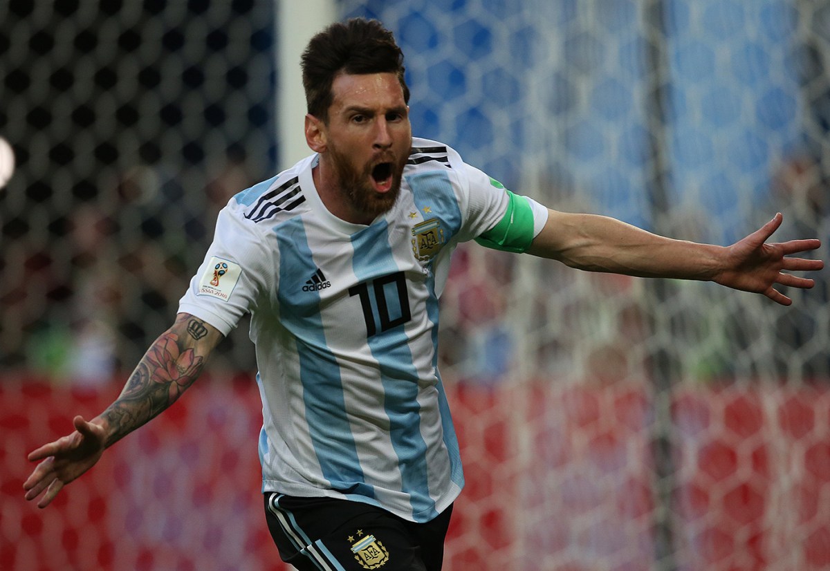 Lionel Messi celebrates scoring for Argentina against Nigeria.