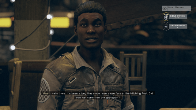 Image of Omari in Starfield wearing a flight jacket, standing up in a bar.