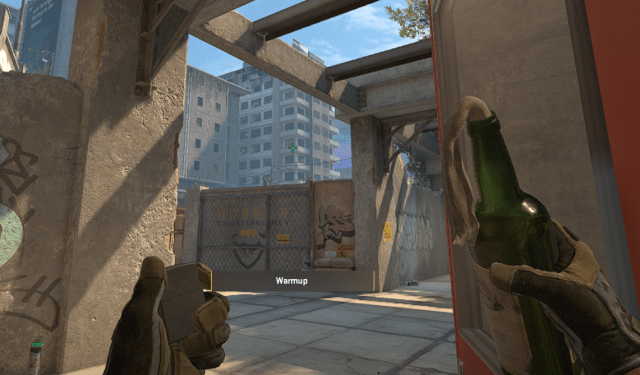 A CS2 character holding a molotov and getting ready to throw it on B Short in Overpass.