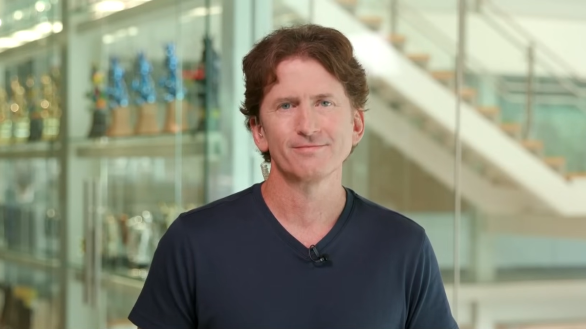 Todd Howard, Bethesda's director and executive producer. Todd is white male in his 50's, has short hair, and is wearing a navy blue T shirt