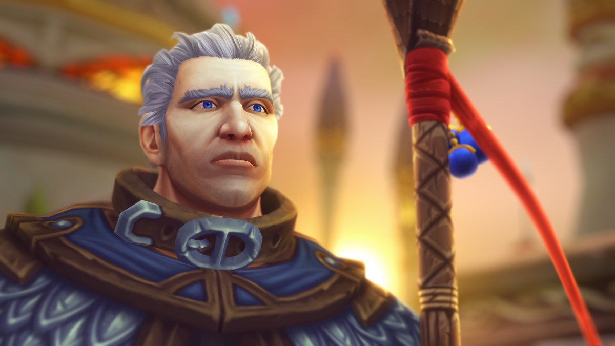 Khadgar holding a staff and looking into the distance.