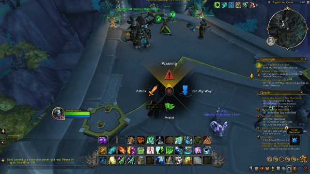 WoW character standing in Thaldraszus and using the ping wheel.