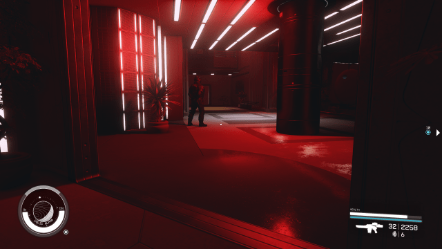 A Ryujin guard in a bright red room 