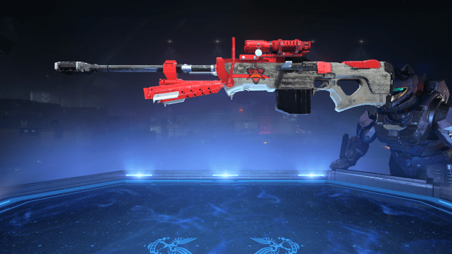 The Halo Infinite sniper rifle is floating in the weapon armory inspection screen. The main body is painted with a light gray camo pattern, while additional components such as the scope and bipod are red.