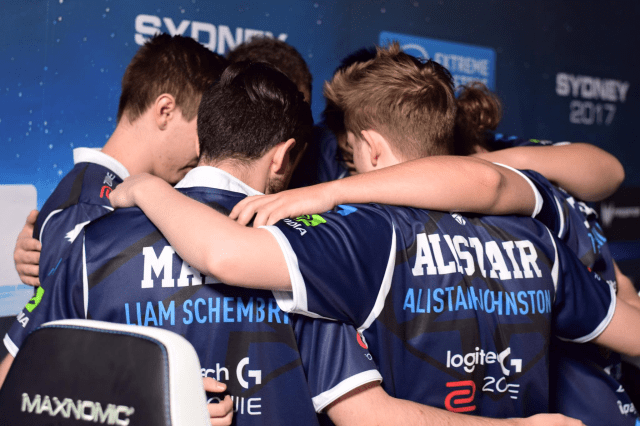 aliStair stands with his Chiefs team in a huddle at IEM Sydney 2017, ready to play CS:GO.