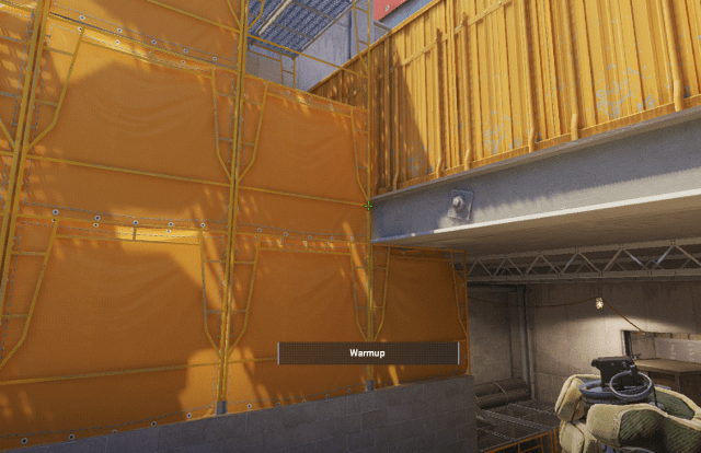 A player lines up a grenade on Vertigo in CS2.