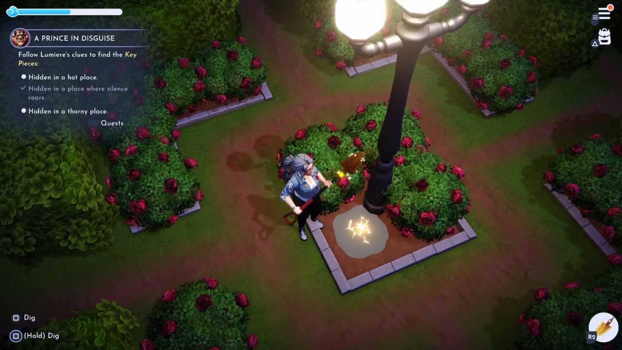 Posta lampu ing jejere taman mawar ing Lembah Dreamlight Disney