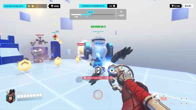 Mercy using a damage buff on the friendly rocket bot. When buffed, bot shoots rocket at the nearby enemies