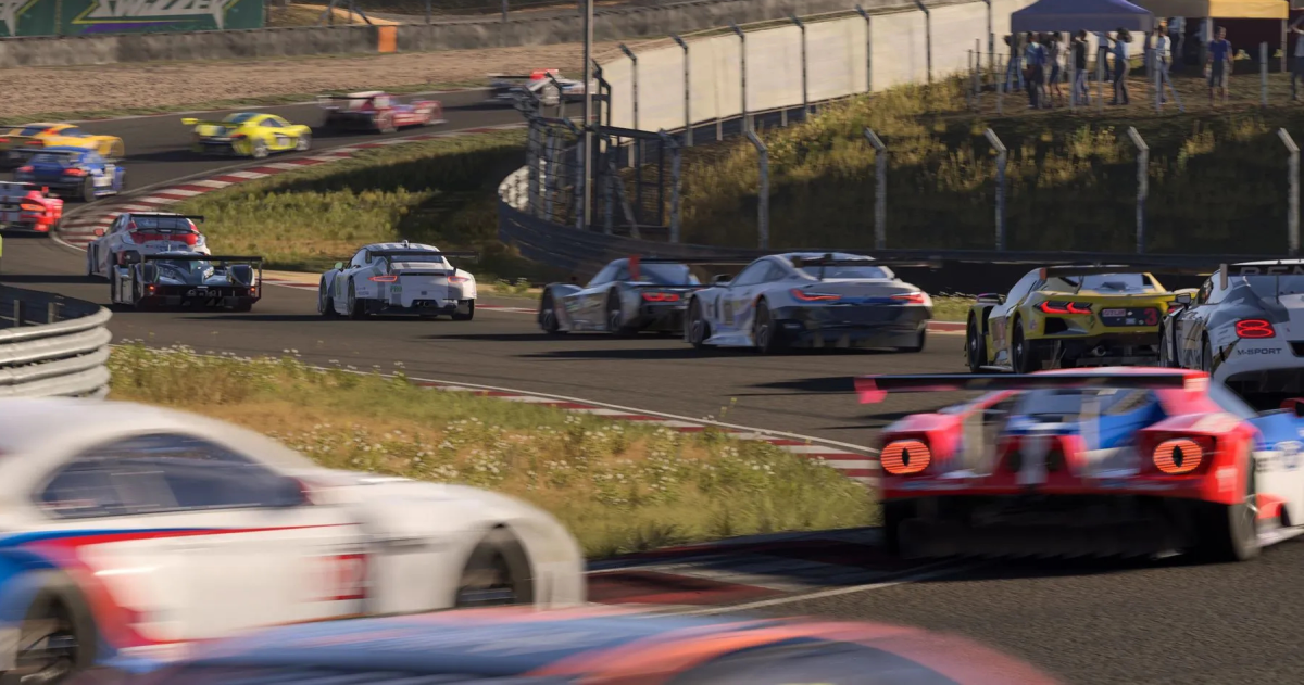 Several cars race around a track in Forza Motorsport.